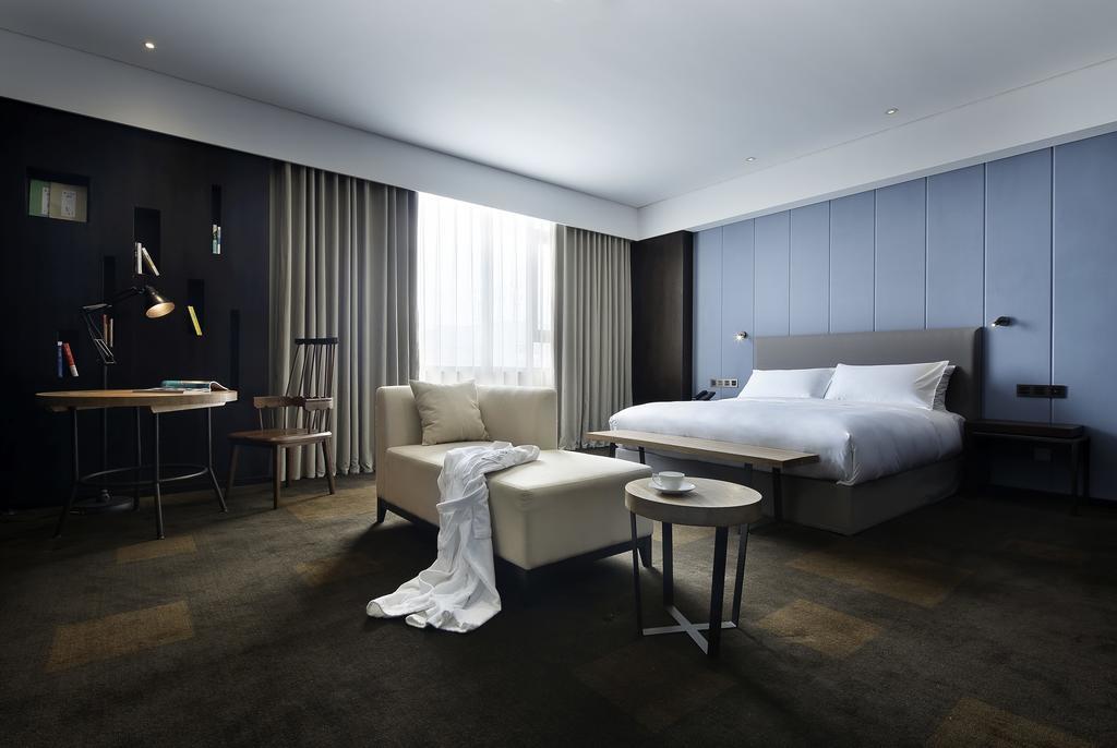 Готель Ease House Luoyang Лоян Номер фото